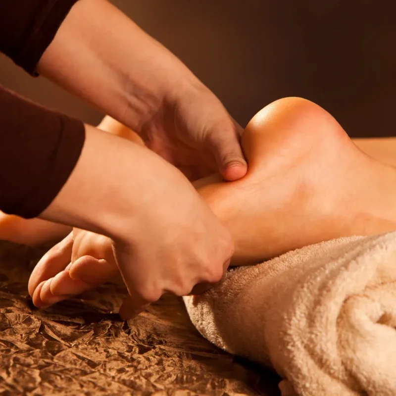 A guest receiving the precision manual therapy of Bespoke Resonance at Agaporia's regenerative sanctuary in Montefollonico, Tuscany