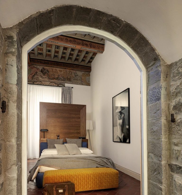 Elegant and spacious Junior Suite with kingsize bed, fireplace and timeless Tuscan charm.