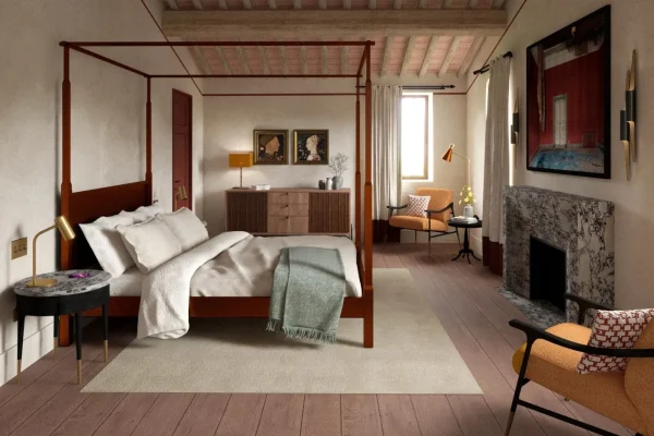 Interior of a 40m² Regenerative Sanctuary at Agaporia with stone and lime-plaster walls, organic textures, and natural light entering through traditional Tuscan window openings.