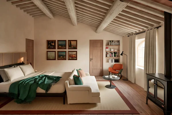 Interior of a 65m² Sovereign Sanctuary at Agaporia opening onto the Tuscan landscape through expanded glazing, with reclaimed chestnut surfaces and lime-plaster walls.
