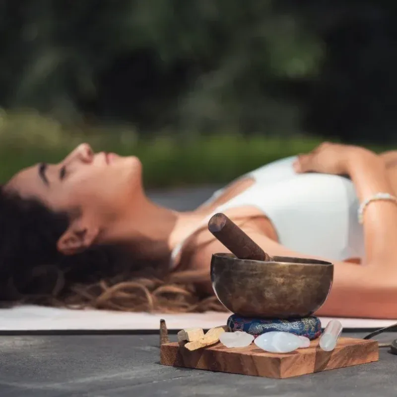A guest engaging with the integrative rituals and wisdom transmissions of Deep Equilibrium within Agaporia's 70-hectare ecosystem in Montefollonico, Tuscany.